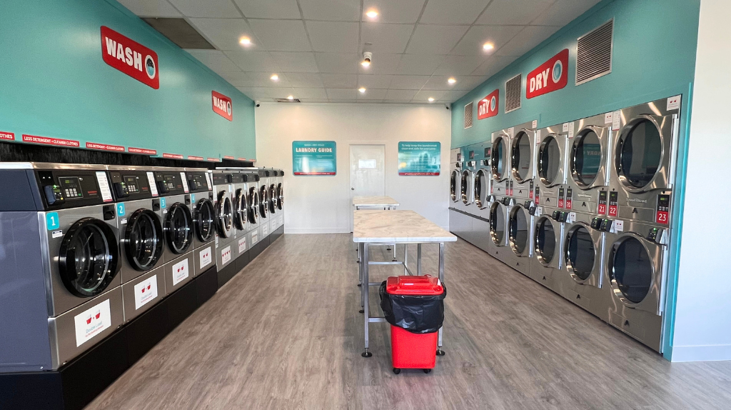 Commercial laundry solution at Speed-e Laundromat with large washers and dryers